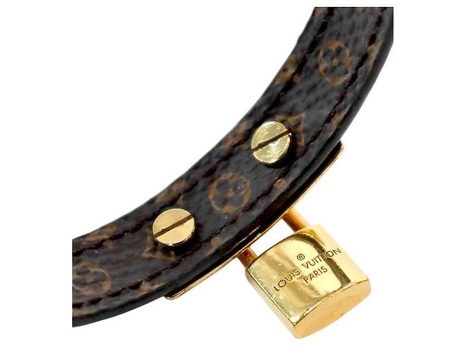 Louis Vuitton Bracciale Nanogram Lockit Gold Nero - vista 5