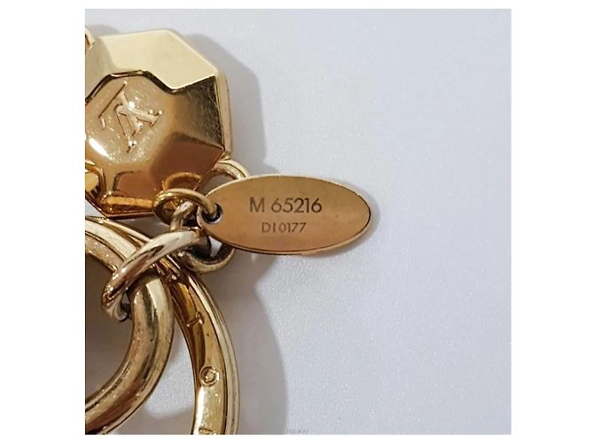 Louis Vuitton Pocket Key Holder Oro Metallo D'oro - vista 6