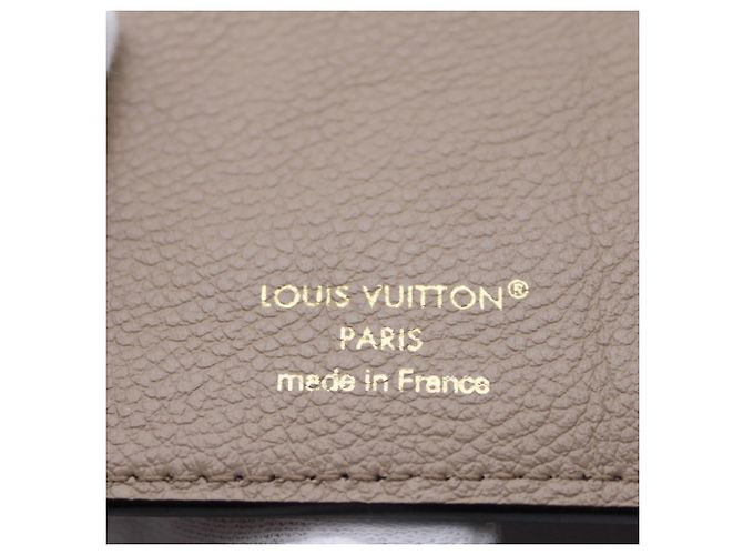 Cartera Louis Vuitton Bi-fold Monogram Empreinte Negro Beige - vista 10