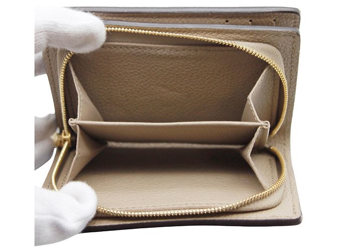 Cartera Louis Vuitton Bi-fold Monogram Empreinte Negro Beige - vista 9