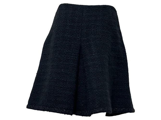 Timeless Falda línea A CHANEL de lana bouclé negra con botón CC - FR 48 de segunda mano - vista 4