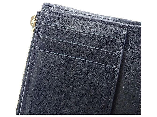 Portefeuille Tri-fold Louis Vuitton en Monogram Noir Monogramme - vue 10
