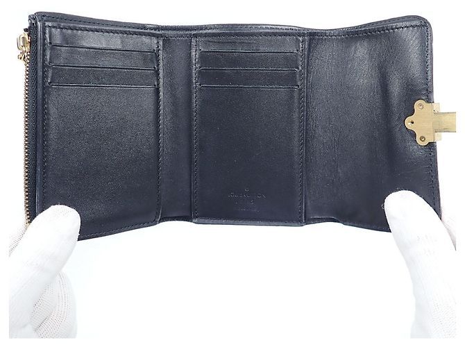 Portefeuille Tri-fold Louis Vuitton en Monogram Noir Monogramme - vue 7