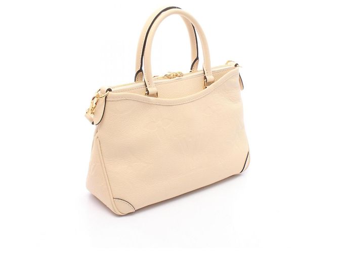 Borsa Louis Vuitton Trianon PM Monogram Empreinte Beige Crudo - vista 2