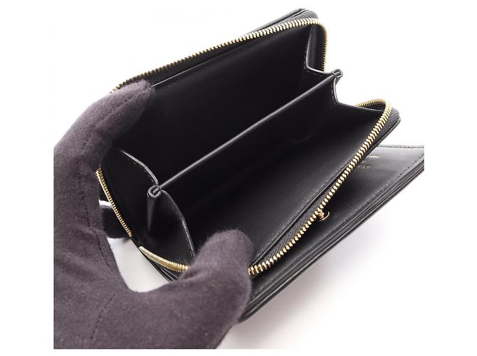 Louis Vuitton Portefeuille Lou Monogram Embossed Bi-fold Wallet Nero - vista 4