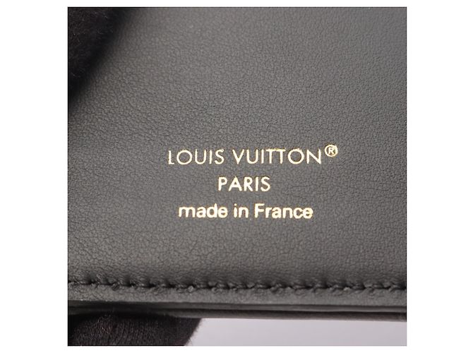Louis Vuitton Portefeuille Lou Monogram Embossed Bi-fold Wallet Nero - vista 5