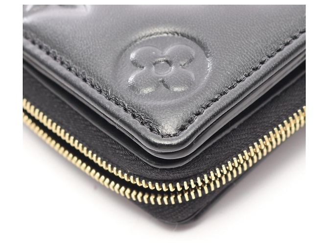 Louis Vuitton Portefeuille Lou Monogram Embossed Bi-fold Wallet Nero - vista 6