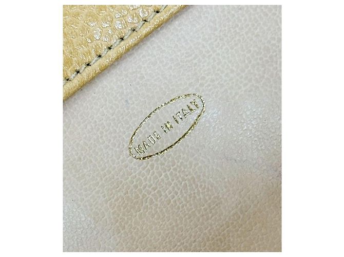 Chanel Mochila de aba acolchoada em couro caviar bege Marrom - vista 12