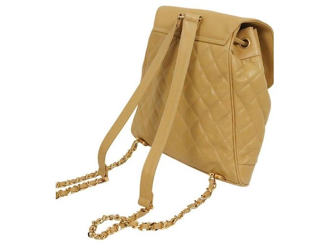 Chanel Mochila de aba acolchoada em couro caviar bege Marrom - vista 6