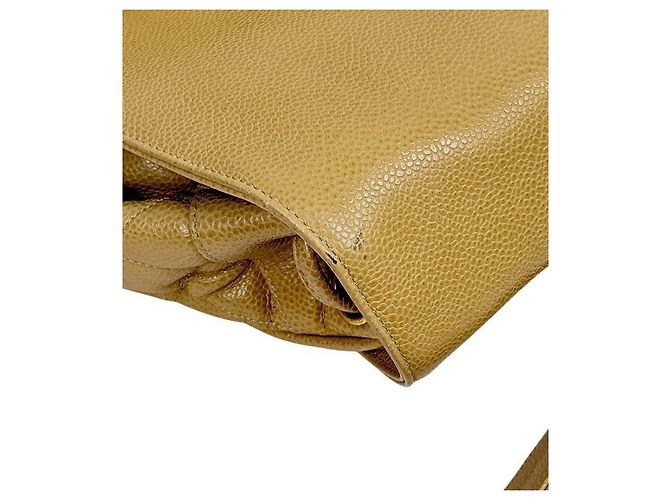 Chanel Mochila de aba acolchoada em couro caviar bege Marrom - vista 9