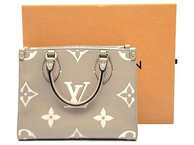 Louis Vuitton Monogram Canvas On The Go PM Marrone - vista 8
