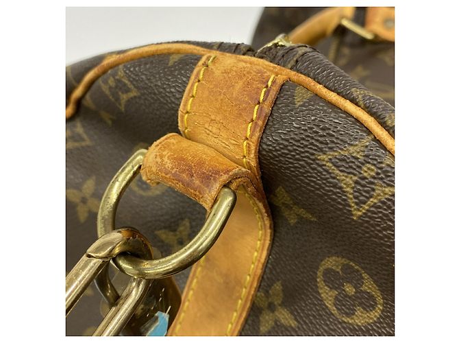 Borsa Louis Vuitton Boston Monogram Keepall Bandoulière 55 Marrone - vista 12