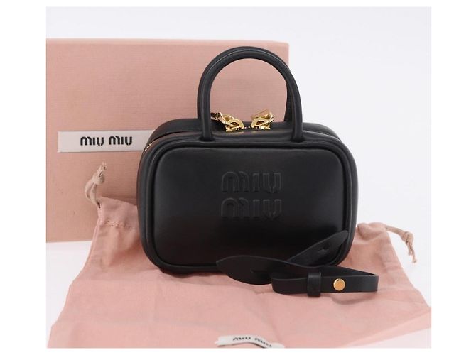 Pouch Miu Miu Beau in pelle nera e oro Auth 202103M Nero D'oro - vista 12