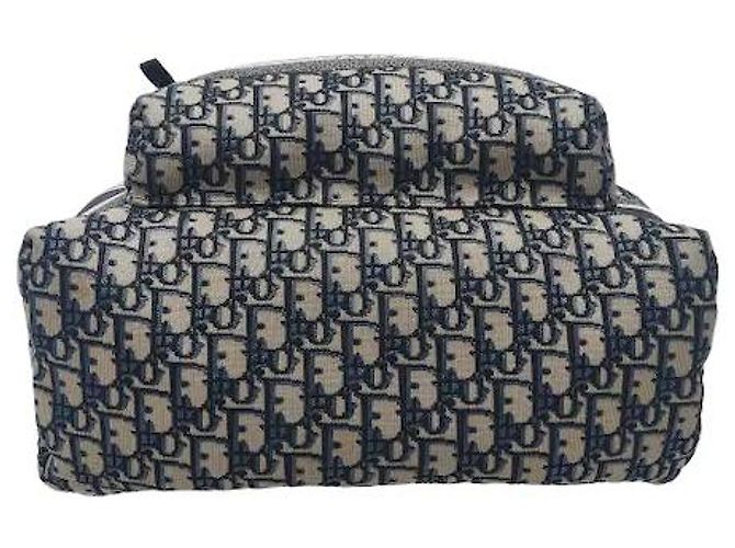 Christian Dior A travel backpack featuring Dior's iconic Oblique jacquard pattern. Made from waterproof technical canvas material, it offers a lighter weight than leather along with scratch-resistant durability. A - view 3
