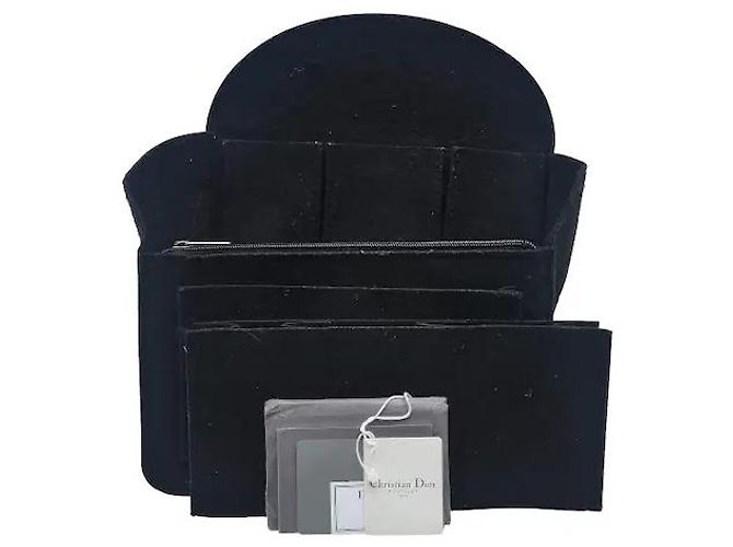 Christian Dior A travel backpack featuring Dior's iconic Oblique jacquard pattern. Made from waterproof technical canvas material, it offers a lighter weight than leather along with scratch-resistant durability. A - view 8