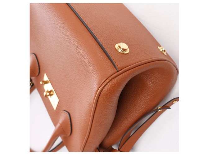 Borsa Louis Vuitton Milla PM Taurillon in Brown M51684 Marrone - vista 9