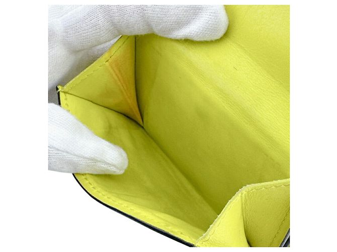 Cartera compacta Louis Vuitton Taigarama Discovery Amarillo - vista 10