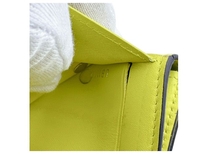 Cartera compacta Louis Vuitton Taigarama Discovery Amarillo - vista 13