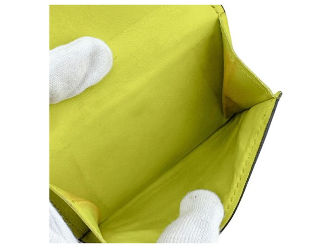 Cartera compacta Louis Vuitton Taigarama Discovery Amarillo - vista 9