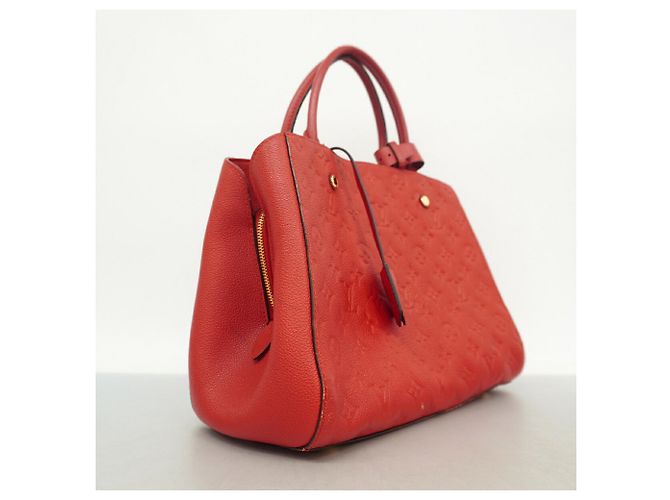 Bolso Louis Vuitton Monogram Empreinte Montaigne MM Fucsia - vista 2