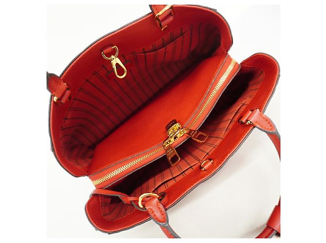 Bolso Louis Vuitton Monogram Empreinte Montaigne MM Fucsia - vista 4