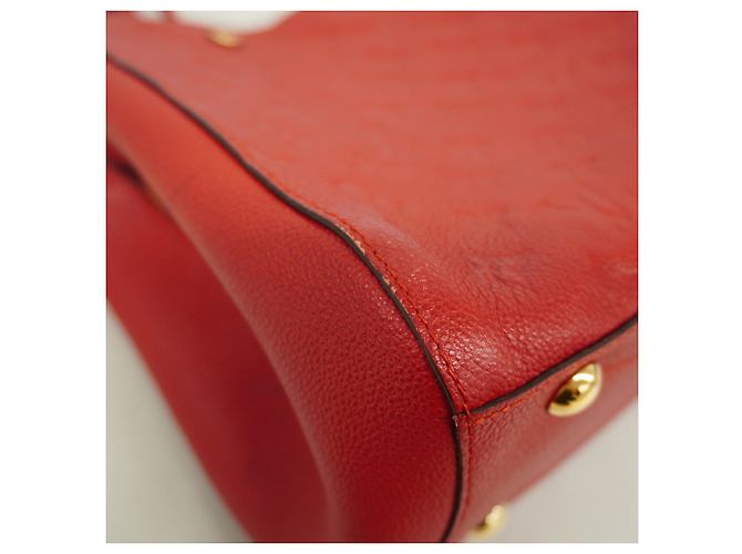 Bolso Louis Vuitton Monogram Empreinte Montaigne MM Fucsia - vista 6
