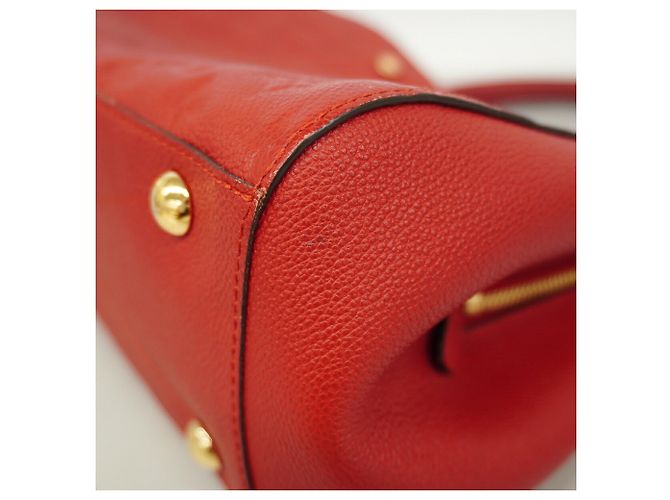 Bolso Louis Vuitton Monogram Empreinte Montaigne MM Fucsia - vista 7