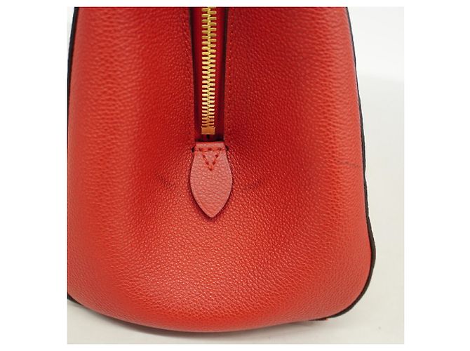 Bolso Louis Vuitton Monogram Empreinte Montaigne MM Fucsia - vista 8