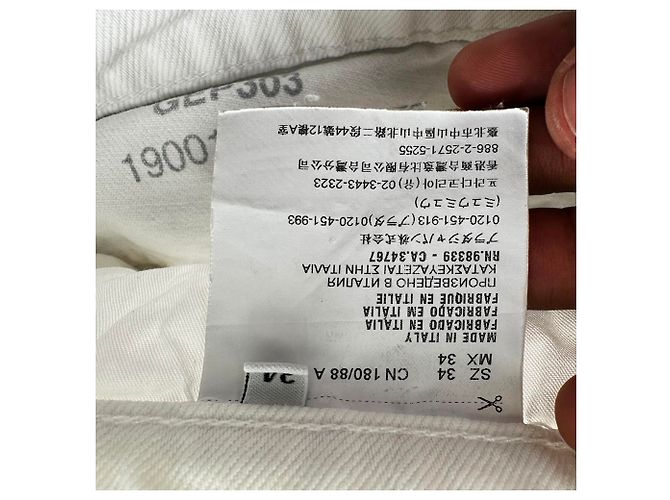 Vaqueros de pierna recta en algodón blanco con parche del logotipo de Prada - vista 10