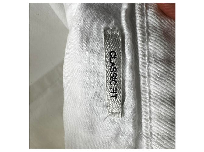Vaqueros de pierna recta en algodón blanco con parche del logotipo de Prada - vista 7