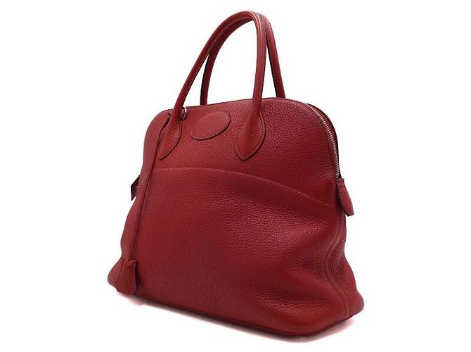 Hermès Saco Tote em couro vermelho com ferragens prateadas Bolide - vista 2