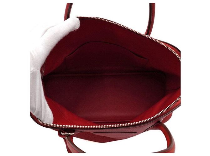 Hermès Saco Tote em couro vermelho com ferragens prateadas Bolide - vista 5
