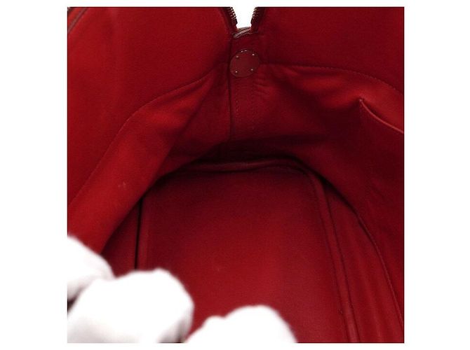 Hermès Saco Tote em couro vermelho com ferragens prateadas Bolide - vista 6