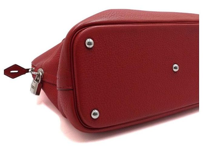 Hermès Saco Tote em couro vermelho com ferragens prateadas Bolide - vista 8