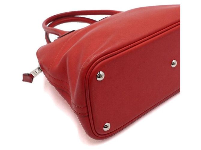 Hermès Borsa Tote Red Swift Bolide con Hardware Argento e Tracolla in Tessuto Rosso - vista 10