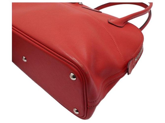 Hermès Borsa Tote Red Swift Bolide con Hardware Argento e Tracolla in Tessuto Rosso - vista 11