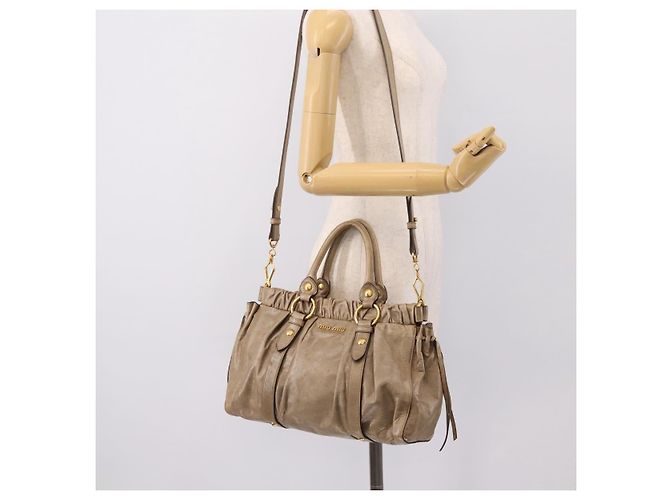 Borsa Miu Miu Vitellolux in pelle 2way Beige Tono Oro Auth 202112A - vista 23