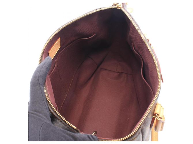 Bolsa Louis Vuitton Turenne MM Monogram Marrom - vista 3