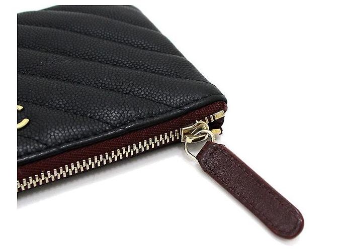 Chanel Mini Pochette Caviar Chevron Nero - vista 10