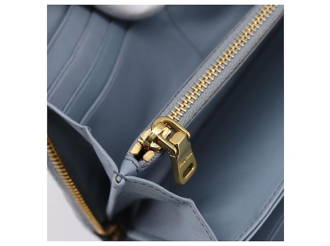 Carteira Longa Miu Miu Matelassé em Couro Azul Claro Tom Dourado Auth 167582A - vista 19