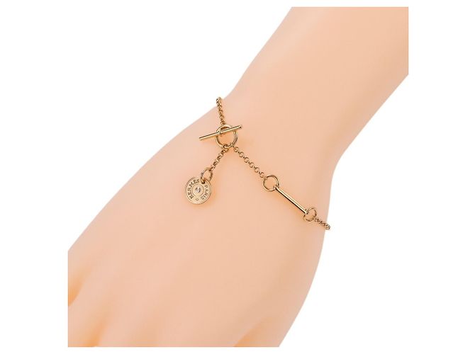 Hermès Set de Pulsera de Dijes Hermes Gambard Dorado - vista 2