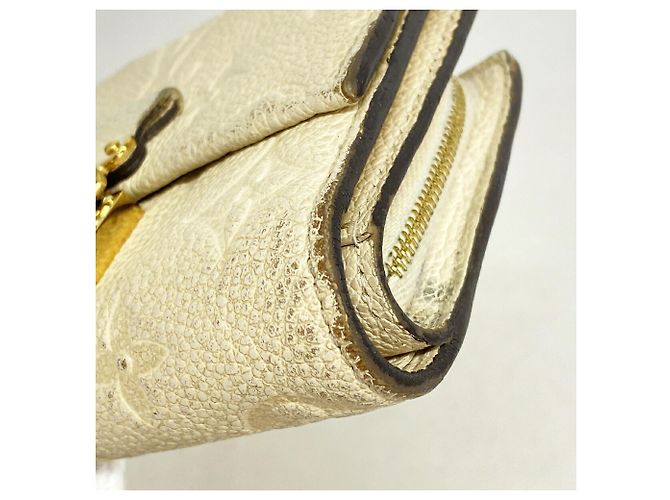 Cartera Louis Vuitton Cream Tri-fold Crudo - vista 5
