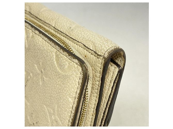 Cartera Louis Vuitton Cream Tri-fold Crudo - vista 6