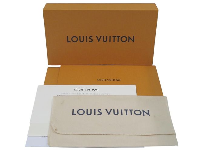 Porte-monnaie Louis Vuitton en cuir noir - vue 5