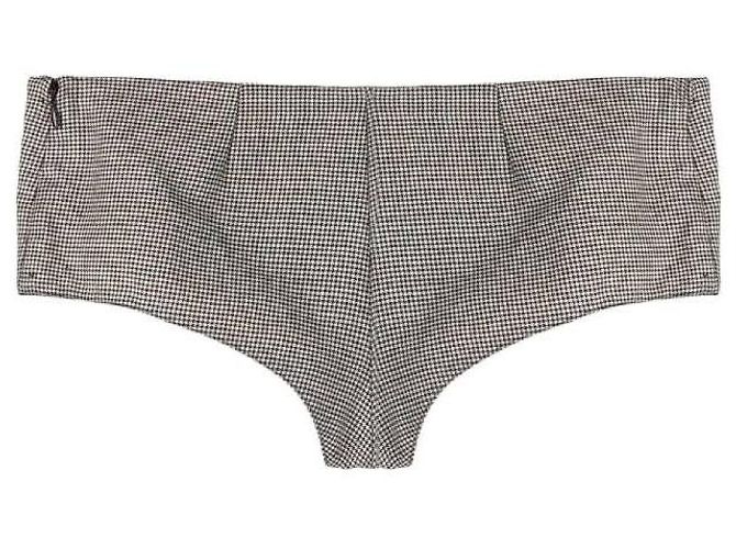 Pantaloncini Versace in lana pied-de-poule nero e beige - vista 2