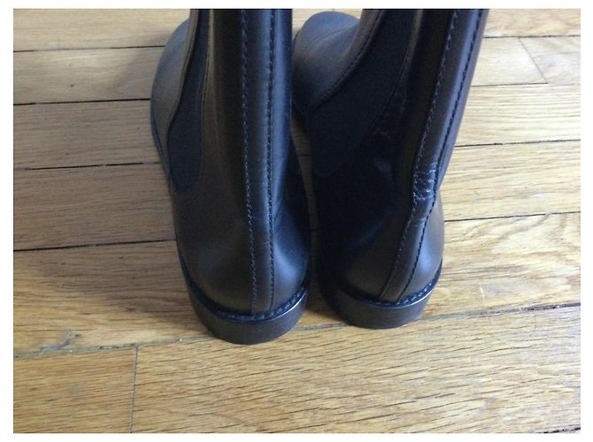 Botas altas Chanel en cuero negro - vista 11