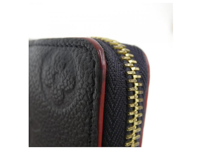 Louis Vuitton Monogram Empreinte Portefeuille Clemence Wallet Rosso - vista 4