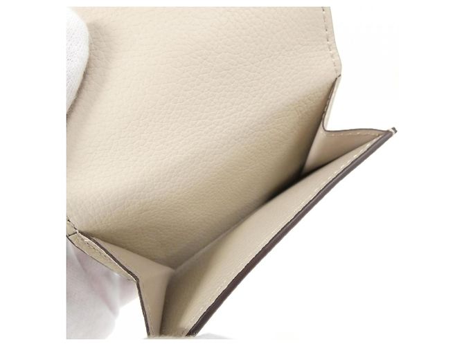 Louis Vuitton Portefeuille Lock Mini Wallet Grigio - vista 4