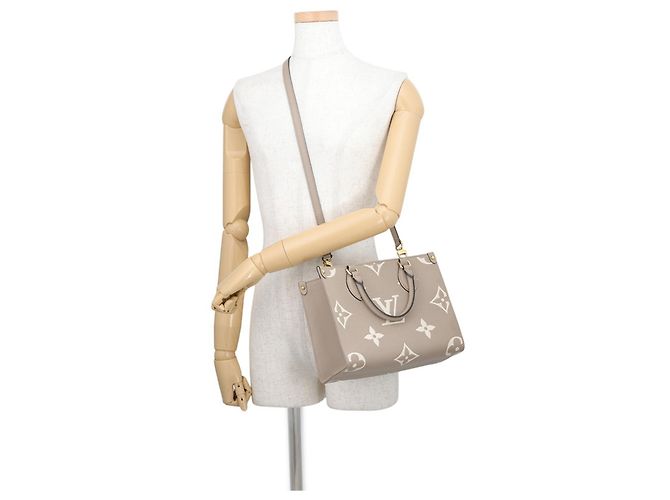Bolso Louis Vuitton Monogram Empreinte OnTheGo PM Gris - vista 5