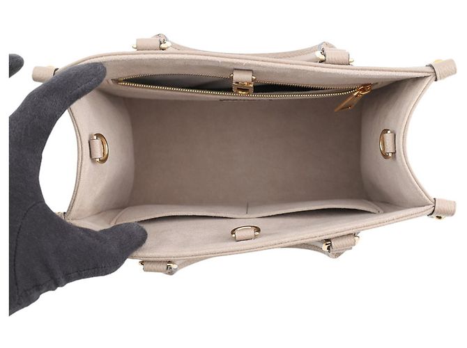 Bolso Louis Vuitton Monogram Empreinte OnTheGo PM Gris - vista 6